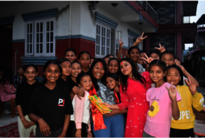 India Director, Cheme, with students in Nepal