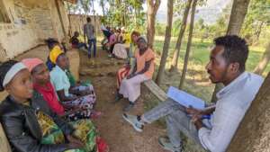 HOPE staff collect feedback from community members