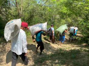 Corn delivery by Cooperacion Comunitaria