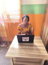 Lois on duty at GEM office