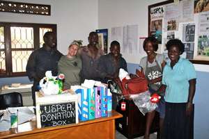 Haven staff and Nicole with gifts