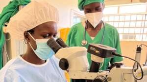 Uganda eye doctor at wok in government hospital
