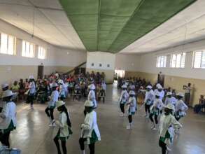 School girls kicking off the nets provision event