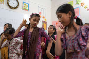 Girls doing cultural activities in group