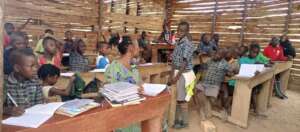 Teacher with full classroom of children