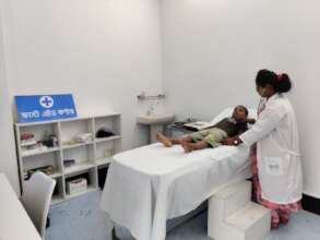 Jannatul taking care of a child patient