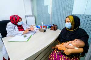 Doctor consultation to mother and child