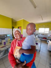 Cook with her grandson