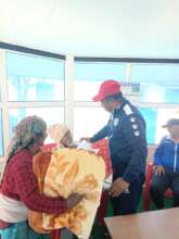 Warm clothes distributed to older people
