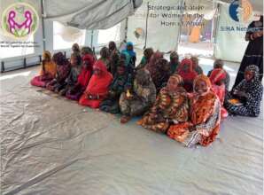 Women & girls participating in PSS session Tawila