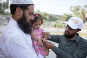 Giving a polio-vaccine in Antock, Punjab, Pakistan