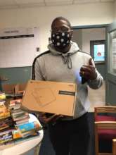 Lamarzs picking up a laptop for virtual programs