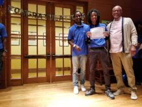 Aaron (center) at the Reentry Recognition Ceremony