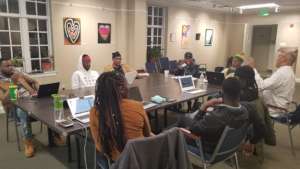 Free Minds members practicing computer skills