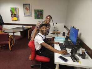 Member Kenneil works on his resume