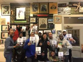 Reentry Book Club poses with "Our Lives Matter"