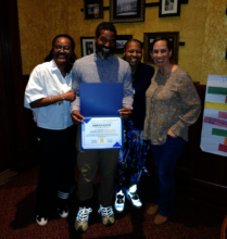 FM member Dewand with Apprenticeship certificate