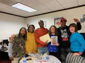 Gene in the office with Free Minds staff