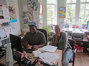 Ms. Keela helping Maurice perfect his resume