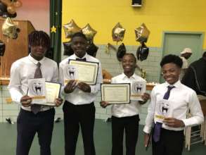 Proud Leckie students with their poetry book