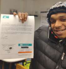 FM member Ryan holds his flagger certificate.