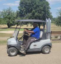 Daniel at work on the golf course