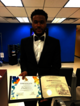 Malik celebrating his graduation