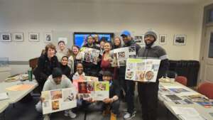 Members and staff with their vision boards