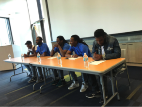 Free Minds members speak on a panel