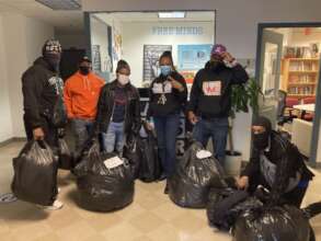 Free Minds members collecting clothing donations