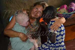 Victoria with two special needs children