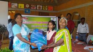 Students receiving their educational kit