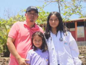 Parent with his daughters during the Achievement F