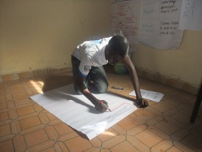 Salihou prepares his presentation
