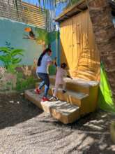 Deteriorated and high stairs to go to the latrines