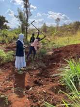 Girls helping on the school land