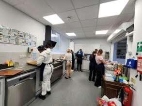 The Team getting to know the new smaller kitchen