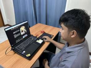 Our deaf apprentice building a website