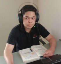 Mr Dear providing training during online course