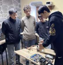 Senior student explains a computer's structure