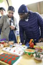 The student presents their work at the festival