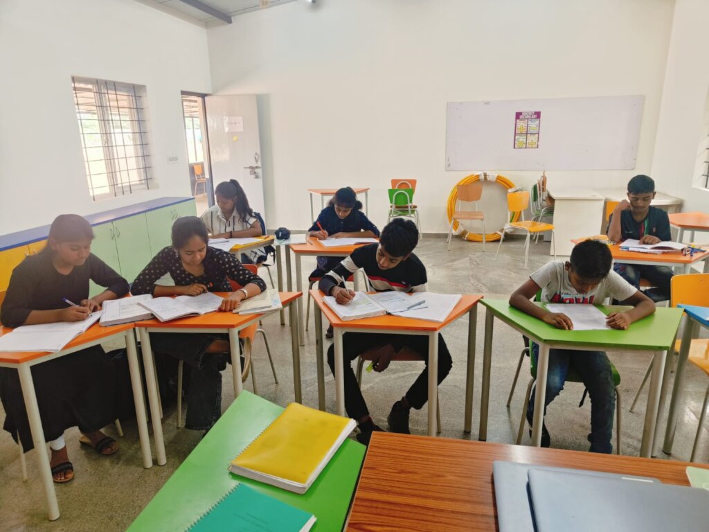 Build 10 classrooms for a school in India