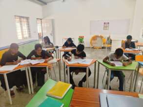 Build 10 classrooms for a school in India