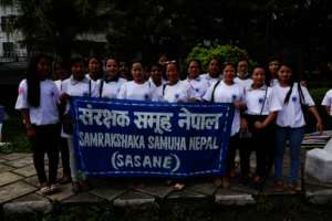 Survivor girls in women's day rally.jpg