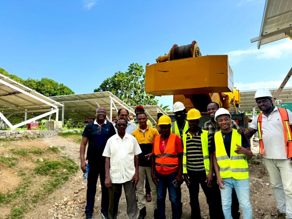 Ministry officials visit the new solar panels.