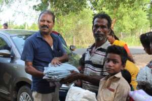 Distribution of cloths to the tribal community