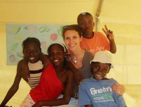 The kids with their volunteer English teacher