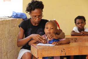Helping little ones learn. Credit ALM Photograpy