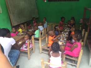The younger children enjoying their Easter dinner