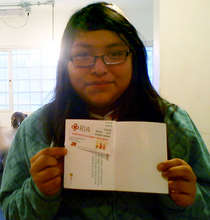 Miriam receiving her scholarship